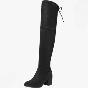Black thigh high suede boots with heel